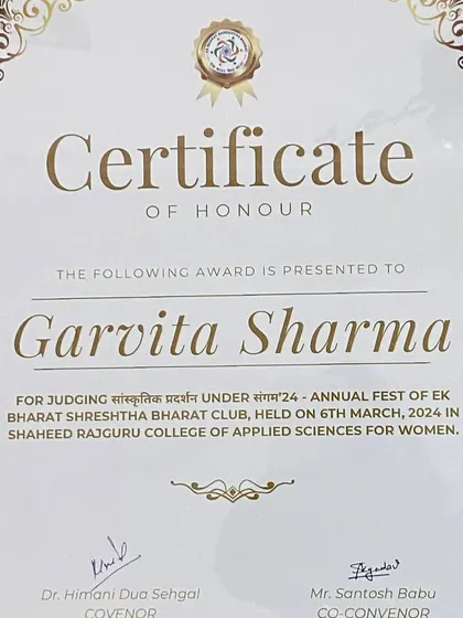 A close-up of the Certificate of Honour presented to me by the Ek Bharat Shreshtha Bharat Club of Shaheed Rajguru College. I hold these tokens of appreciation with great respect and gratitude.