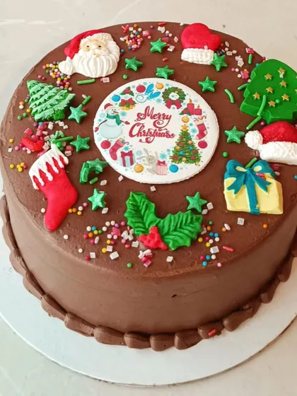 A classic chocolate cake with festive toppers is always a good idea for Christmas celebrations.