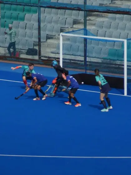 Chaos in front of the goal as my players fight to score. These moments test our players' reflexes and determination in the attacking circle.