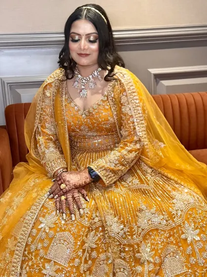 A final shot of the bride in her yellow Anarkali, looking serene and beautiful.