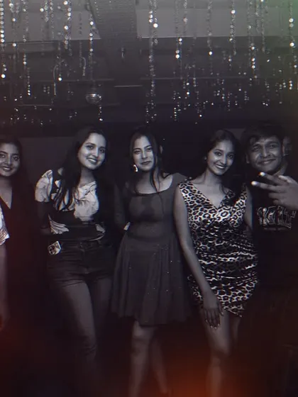 Posing for a group photo with friends and fans during the 'Haseen Raat' event. These are the connections that make the night special.