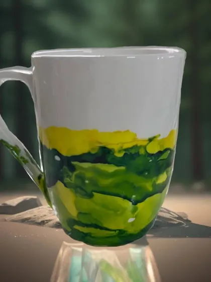 A personalized mug decorated with vibrant alcohol inks. This is one of the three different projects you can learn in my comprehensive alcohol ink workshop.