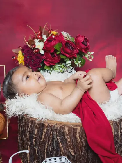 A more relaxed moment, with the baby looking content and peaceful.