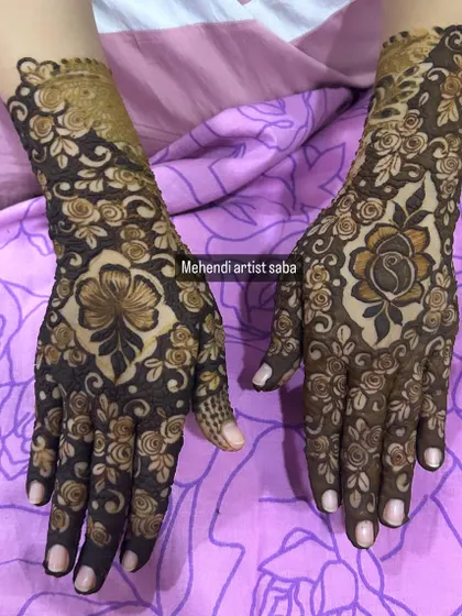 A close-up of the design with a large central flower, showing the intricate details within the petals.