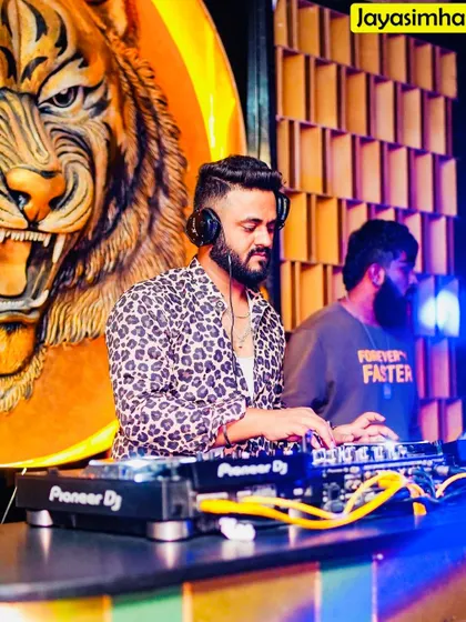 In the zone at Badmaash, with a giant tiger mural behind me. The vibe is fierce.