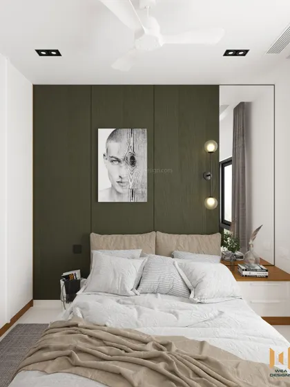 A view of the bed with its simple headboard and a full-height mirror on the side table, a trick to make the room feel larger.