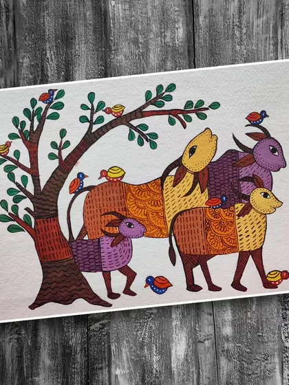 A charming Gond art piece showing animals and birds around a tree. This style often depicts scenes from nature and the interconnectedness of all living things.