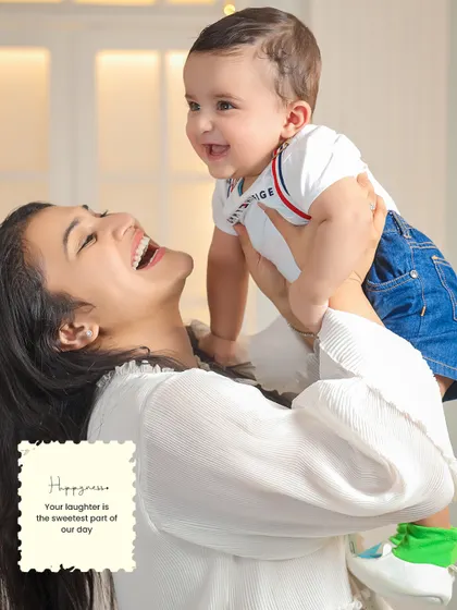 Unscripted laughter is one of my favorite things to photograph. This candid shot of a mother and her son is all about capturing authentic joy, showing the beautiful, energetic connection that makes each family unique.