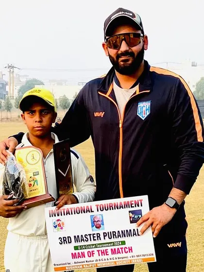 Celebrating our U-14 team's victory in the 3rd Master Puranmal Cricket Tournament. Here I am with Aarush, the Man of the Match, a well-deserved award for his performance.