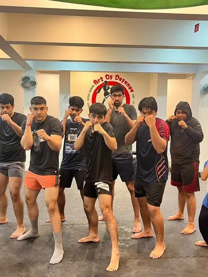 A close up of our members in their fighting stance. You can see the focus and determination in their eyes, reflecting the serious but supportive culture we cultivate.