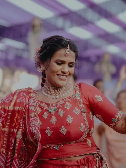 All eyes on the groom's gorgeous mom. Her happiness and radiance are what it's all about.