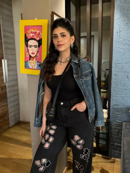 Actress Sanjana Sanghi looking cool and casual before the concert. I created a stylish half-updo with beachy waves that's both trendy and comfortable.