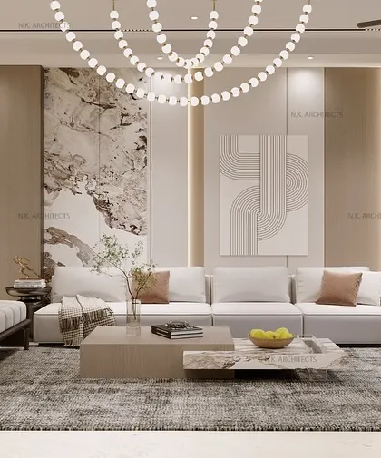 This living room is a serene haven, designed with a blend of beige tones and light wooden textures. A modern, flowing chandelier adds a touch of elegance, creating the perfect balance of warmth and sophistication.