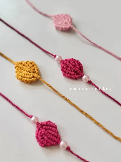 These knotted Rakhis are also available with a small pearl bead for an extra touch of elegance.