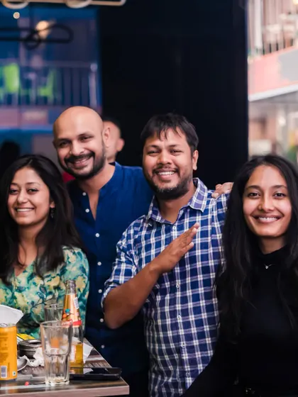 A group of friends posing for a photo.