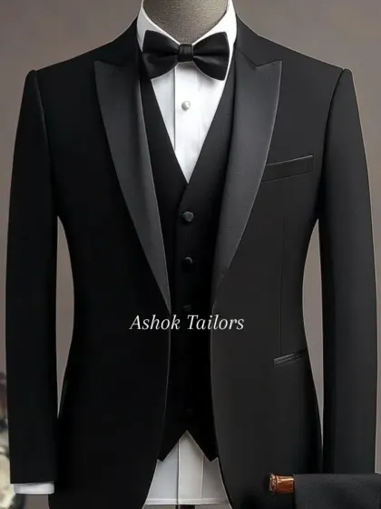 The quintessential black tuxedo. This three-piece suit with satin lapels is a must-have in every man's wardrobe. My version is tailored for a perfect, modern fit.