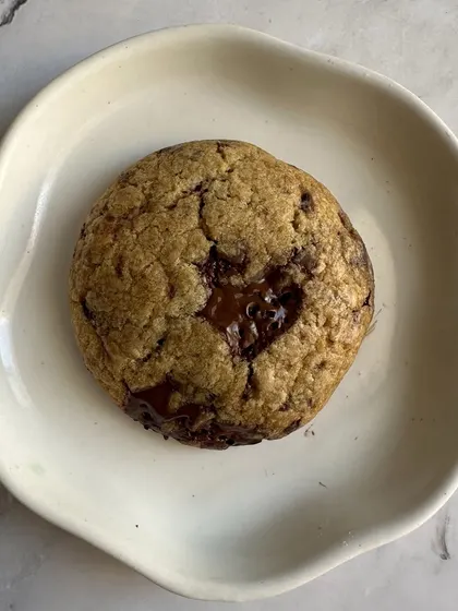 Golden edges, a gooey center, perfection. This is my classic Chocolate Chip Cookie, with a heart-shaped pool of melted Belgian chocolate.