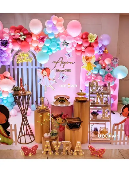 The full setup for this bright and cheerful fairy party.