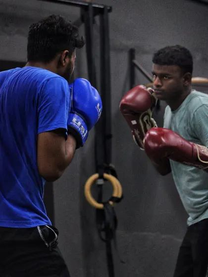 Two young fighters locked in, focused on technique. This is where you see the future of the club being built.