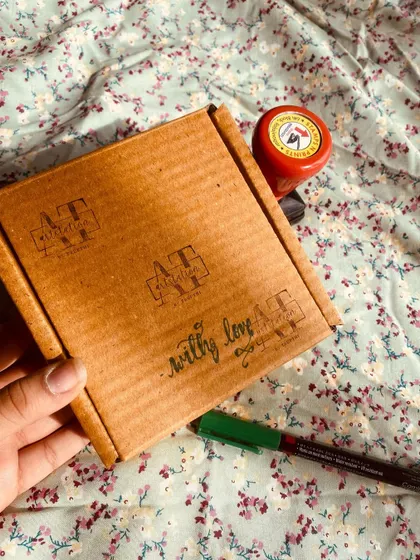 This is how I package and send out my polaroid orders, in a hand-stamped box with a "with love" message. It’s all about the personal touch from start to finish.