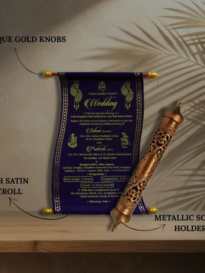 A closer look at the details of our scroll invites. This image highlights the antique gold knobs, rich satin scroll, and metallic scroll holder that make these invitations so special.