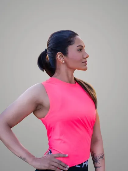 A professional headshot. This represents my commitment to my brand and my clients as a certified personal trainer and online coach.