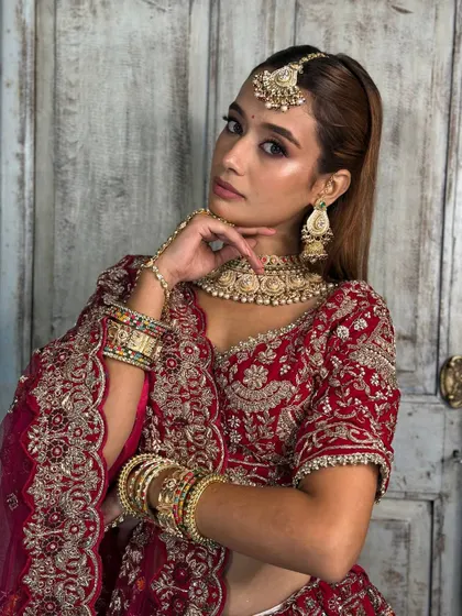 A closer look at the details of this bridal glam. Notice how the contoured features and defined eyes stand out, creating a look that is both soft and powerful.