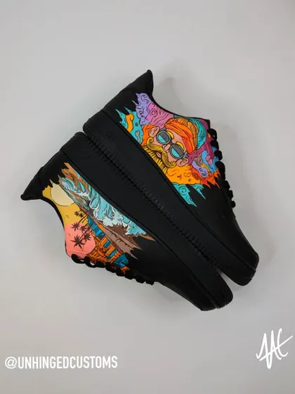 A full view of the "2 States" custom AF1s. The vibrant, colorful art looks amazing against the all-black sneaker.