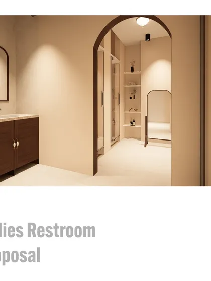 A render of the proposed ladies' restroom, showing the view from the vanity area towards the shower stalls. The design uses an archway to create a graceful transition and includes open shelving for a spa-like feel.