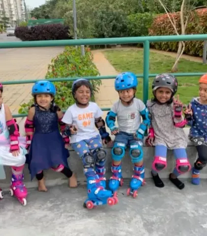 A group of happy skaters posing for a photo, showing the friendships and fun that are part of our classes.