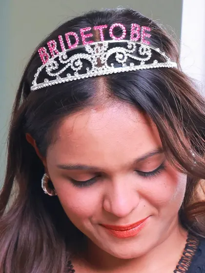 Every bride deserves to feel like a queen for a day. This beautiful "Bride to Be" tiara is the perfect accessory for her bachelorette party or bridal shower, adding a touch of sparkle to her special celebration.