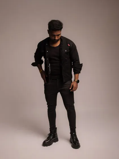 A full-length standing shot that provides a clear view of the model's proportions and the complete outfit.