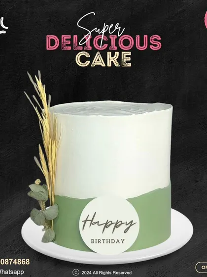 A minimalist and rustic birthday cake. This two-toned green and white cake is decorated with a simple "Happy Birthday" plaque and a sprig of dried wheat for a natural, elegant touch.
