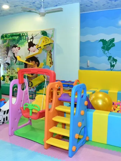 The toddler play area at our Banashankari location is bright, safe, and filled with age-appropriate equipment to keep our smallest visitors happy.