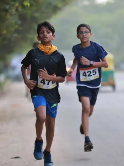 Our BBR program helps young athletes discover their potential. These two boys are pacing each other during a run, learning about endurance, friendly competition, and the power of having a teammate by your side.