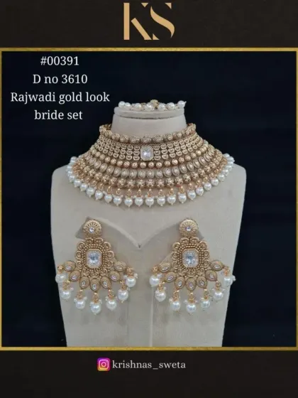 The same Rajwadi bridal set, shown in a timeless all-pearl version. This is a perfect choice for a bride who loves classic elegance.