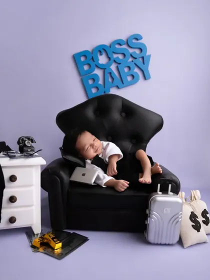 A sleepy smile from our little boss. I love capturing these candid moments that show off your baby's budding personality.