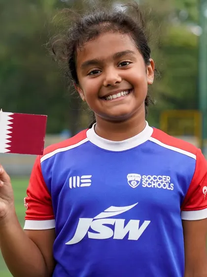 A huge smile from a young player excited about our new venture in Qatar. We are passionate about growing the women's game globally.