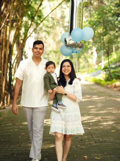 A classic family walking shot, celebrating a first birthday. These photos capture a moment in time as you walk forward into a new year together.
