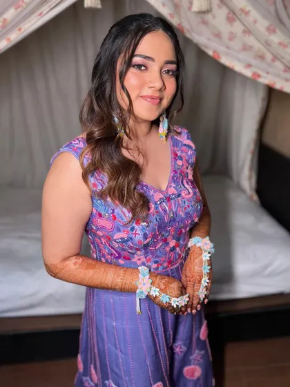 The complete look. This bride is ready for a fun-filled carnival party with her unique and magical makeup.