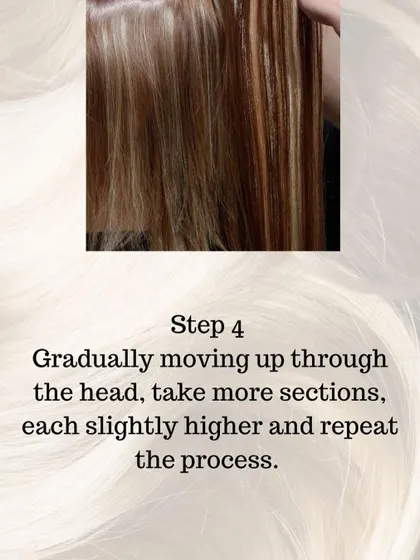 Step 4 of our clip-in guide: Gradually move up the head, taking more sections slightly higher than the last, and repeat the process to build volume evenly.