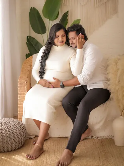 A candid moment of a partner whispering to the baby bump. These unscripted interactions result in some of the most cherished photographs.