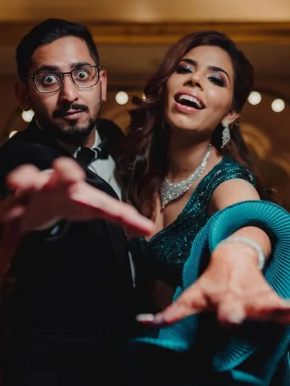 A fun, candid shot of the couple during their reception. My goal is to create a relaxed atmosphere where you can truly be yourselves and have fun.