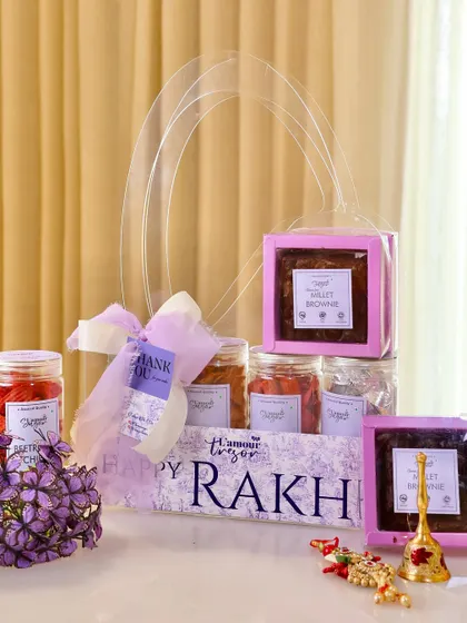 A full view of our Dior inspired healthy Rakhi hamper. It combines mindful treats with luxurious packaging, making it a thoughtful and elegant gift.