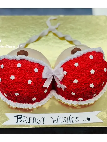 Another look at the 'Breast Wishes' cake, a fun and memorable choice for a bachelor party.