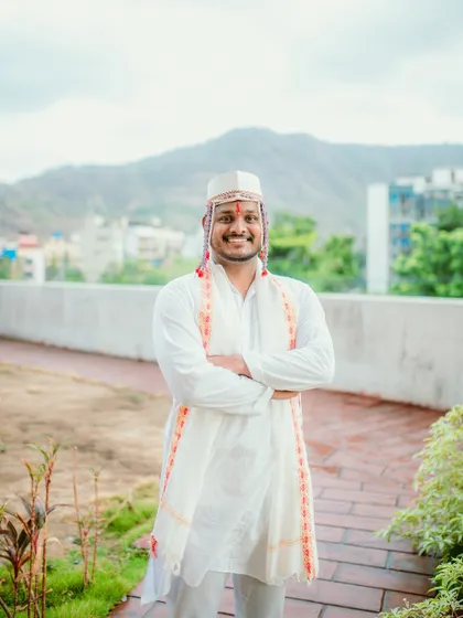 A smiling portrait of the groom before the Haldi rituals begin.