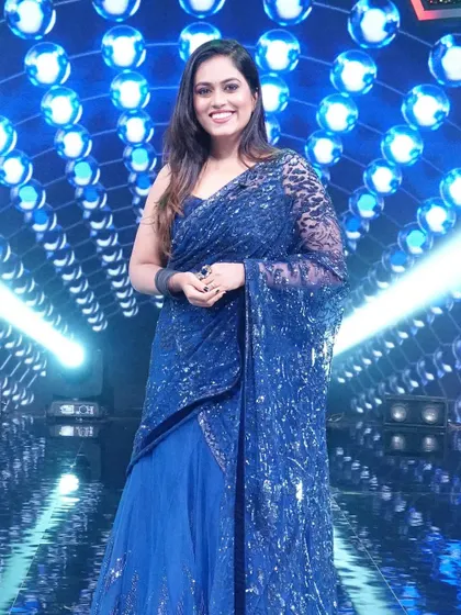 Sayli Kamble shines on stage in this beautiful blue sequined saree, available to rent.