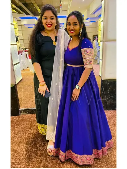A picture with my wonderful client, who always looks gorgeous in the outfits we design together. Her blue Anarkali is a testament to our collaboration.