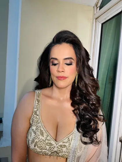 A close-up on the eye makeup. I used soft, shimmery tones to create a look that is glamorous but not too heavy for a wedding guest.