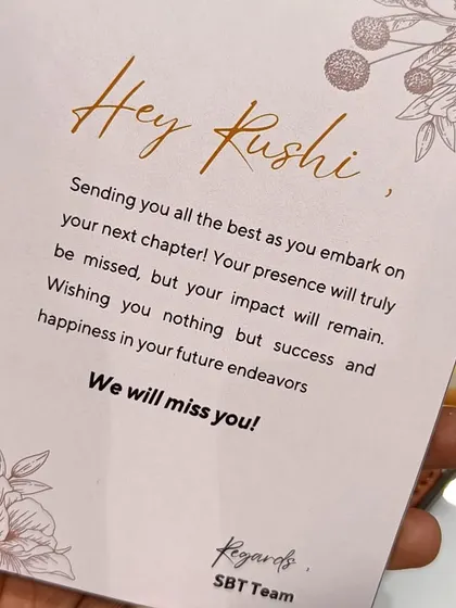 The personalized farewell card for Rushi, wishing him success in his next chapter from the entire team.